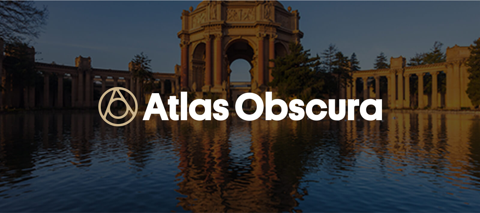 Atlas Obscura logo with historic building in background