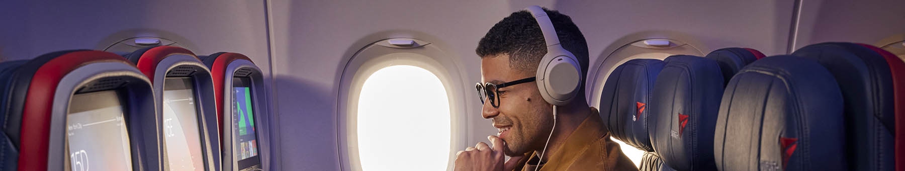 Man enjoying inflight entertainment