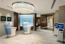 People lounging in the Delta Sky Club