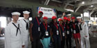 Sailors with Delta employees