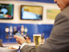 man sitting at the bar