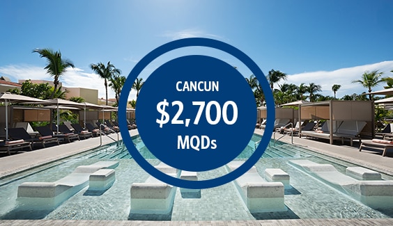Hotel Riu Palace Mexico Resort in Cancun with outdoor pool and $2700 MQDs vacation offer in blue circle