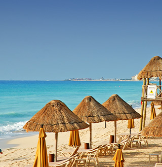 Beach umbrellas in Cancun.