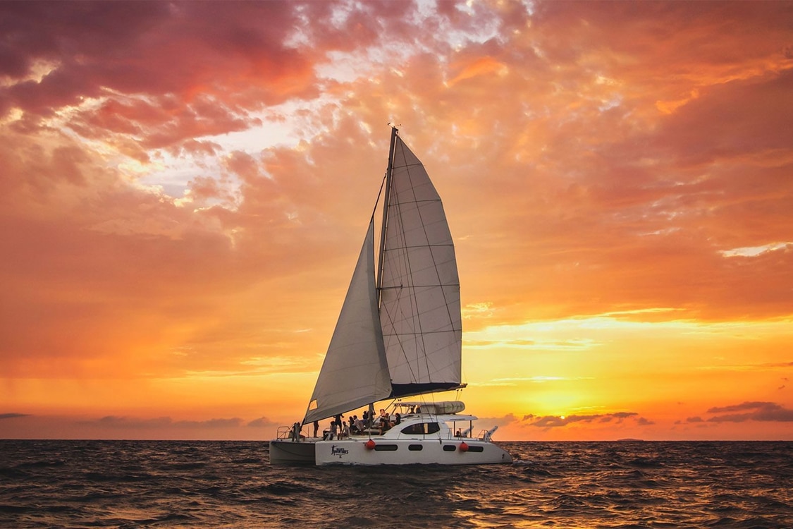 Sunset boat over Cancun waters. 