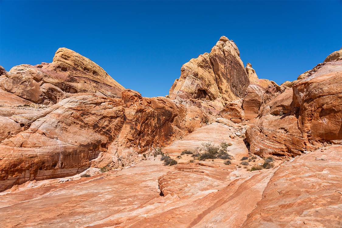 Red rock desert landscape with layered sandstone formations near Las Vegas. 